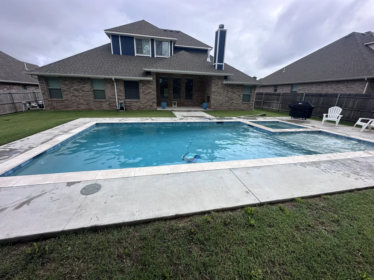 Rectangular pool with deck and patio