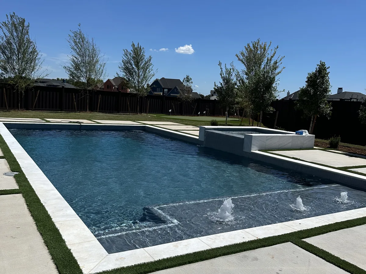 Rectangular pool with wide concrete decking